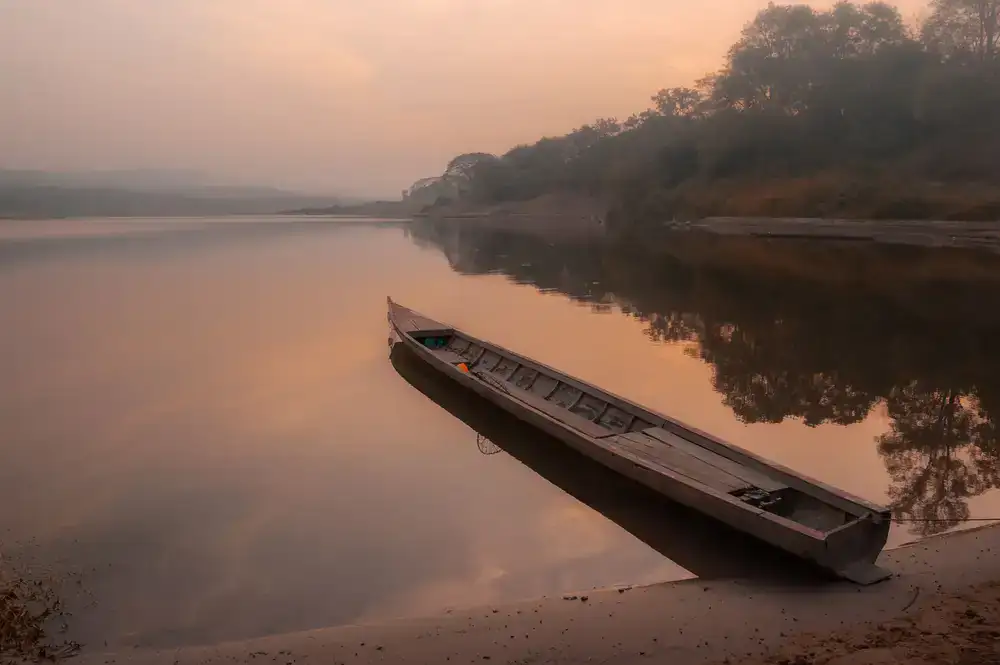 A tranquil morning view over calm waters ready for paddling