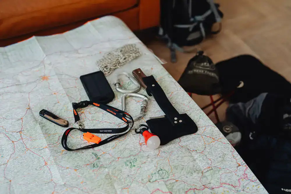 Close up of paddling gear and a map
